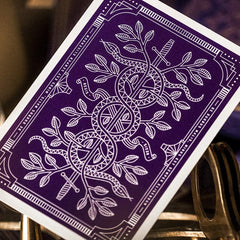 theory11 Monarchs Purple back design enhances readability and visual appeal.