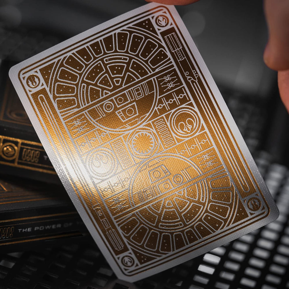 theory11 Star Wars premium cards back design in gold foil with radiant shimmer.