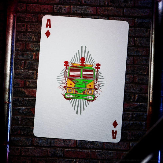 The theory11 TMNT premium playing cards back artwork with green red silver foil on black stock.