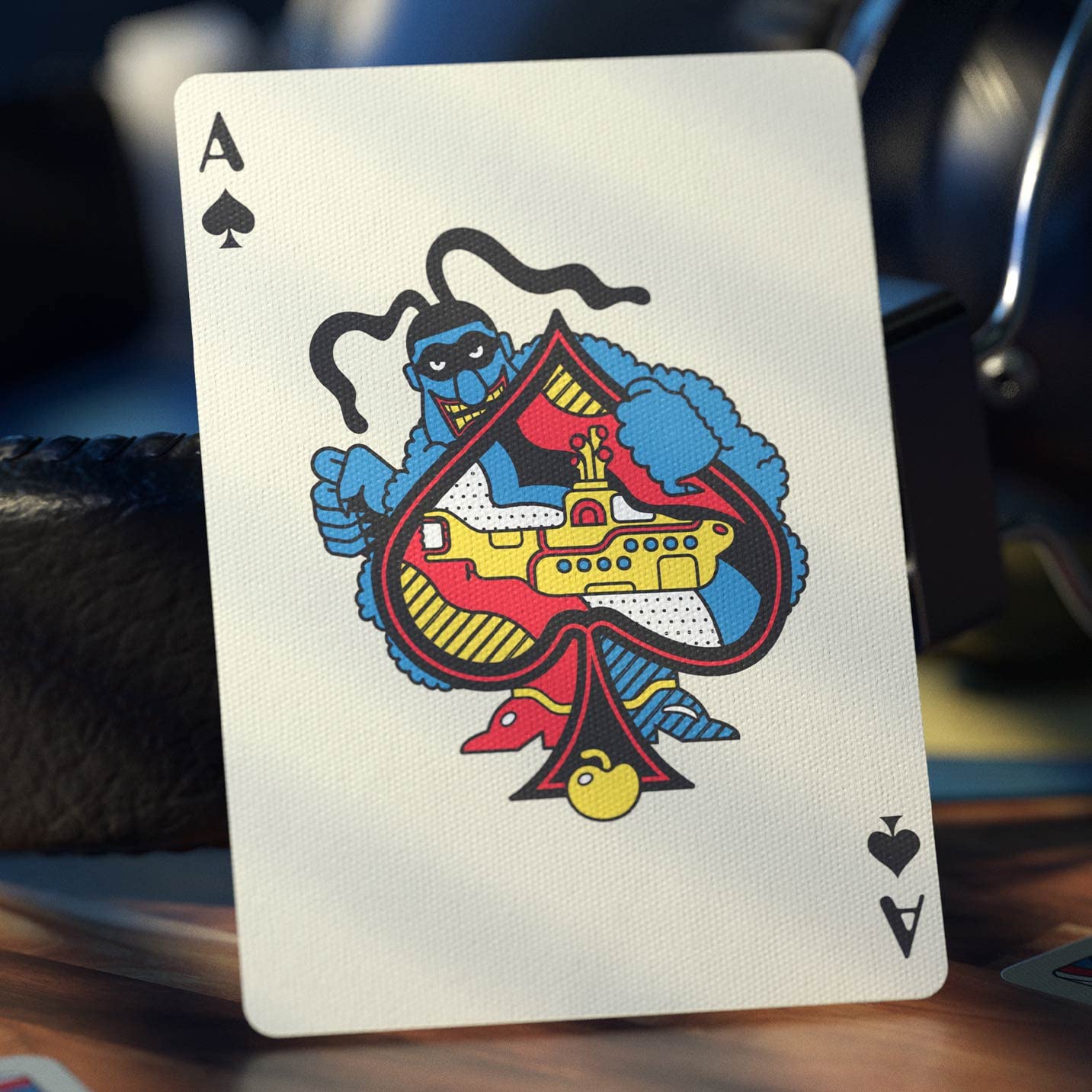 theory11 Yellow Submarine box back highlighting deep black foil accents.