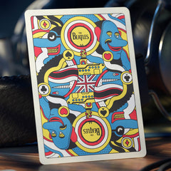 theory11 Yellow Submarine deep black foil highlights cards with striking contrast.