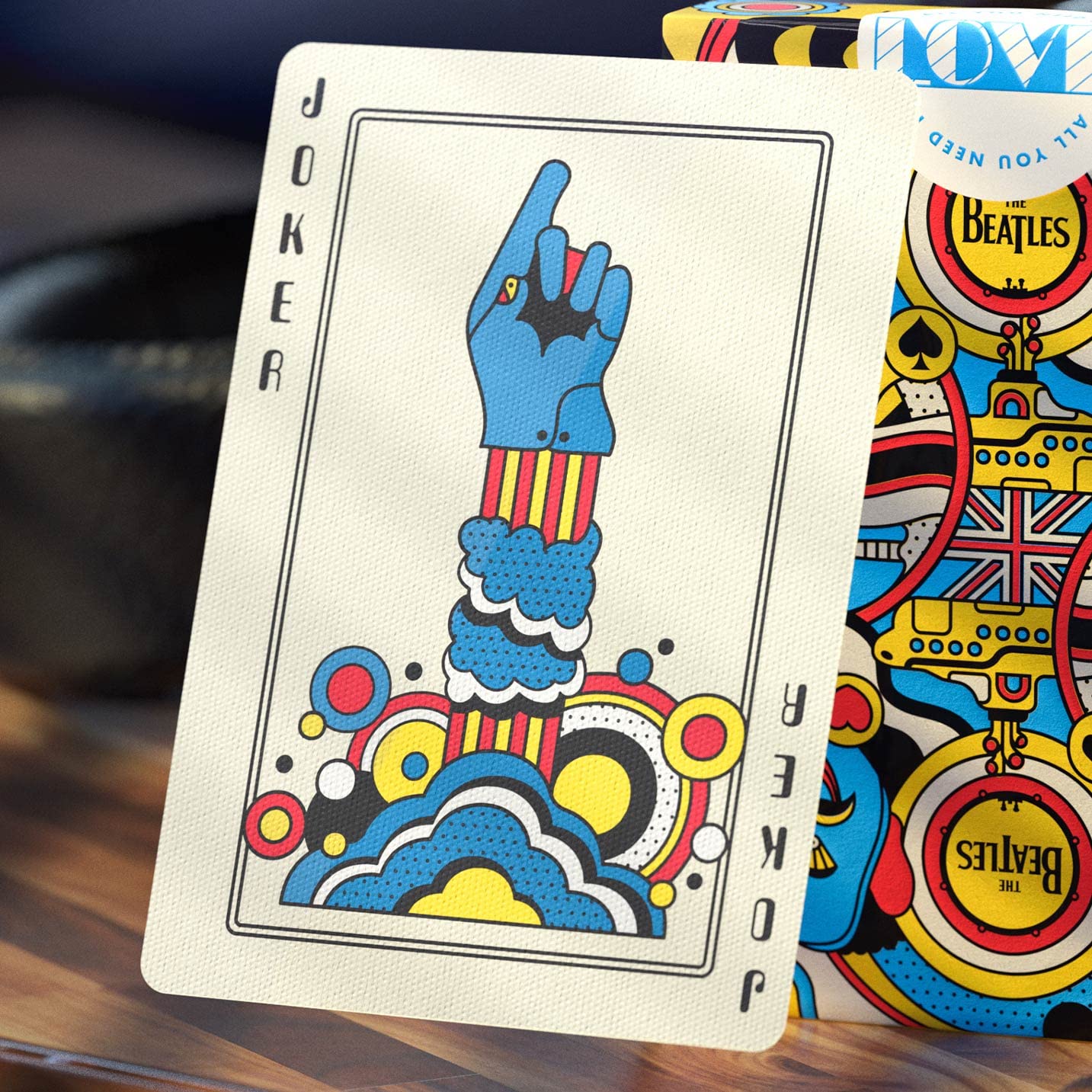 theory11 Yellow Submarine illustrated card faces capture classic animation style.