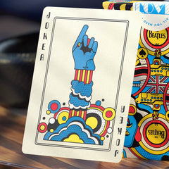 theory11 Yellow Submarine illustrated card faces capture classic animation style.