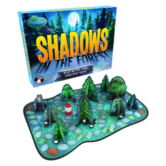 ThinkFun Shadows in the Forest game board glows softly for a suspenseful family play session.