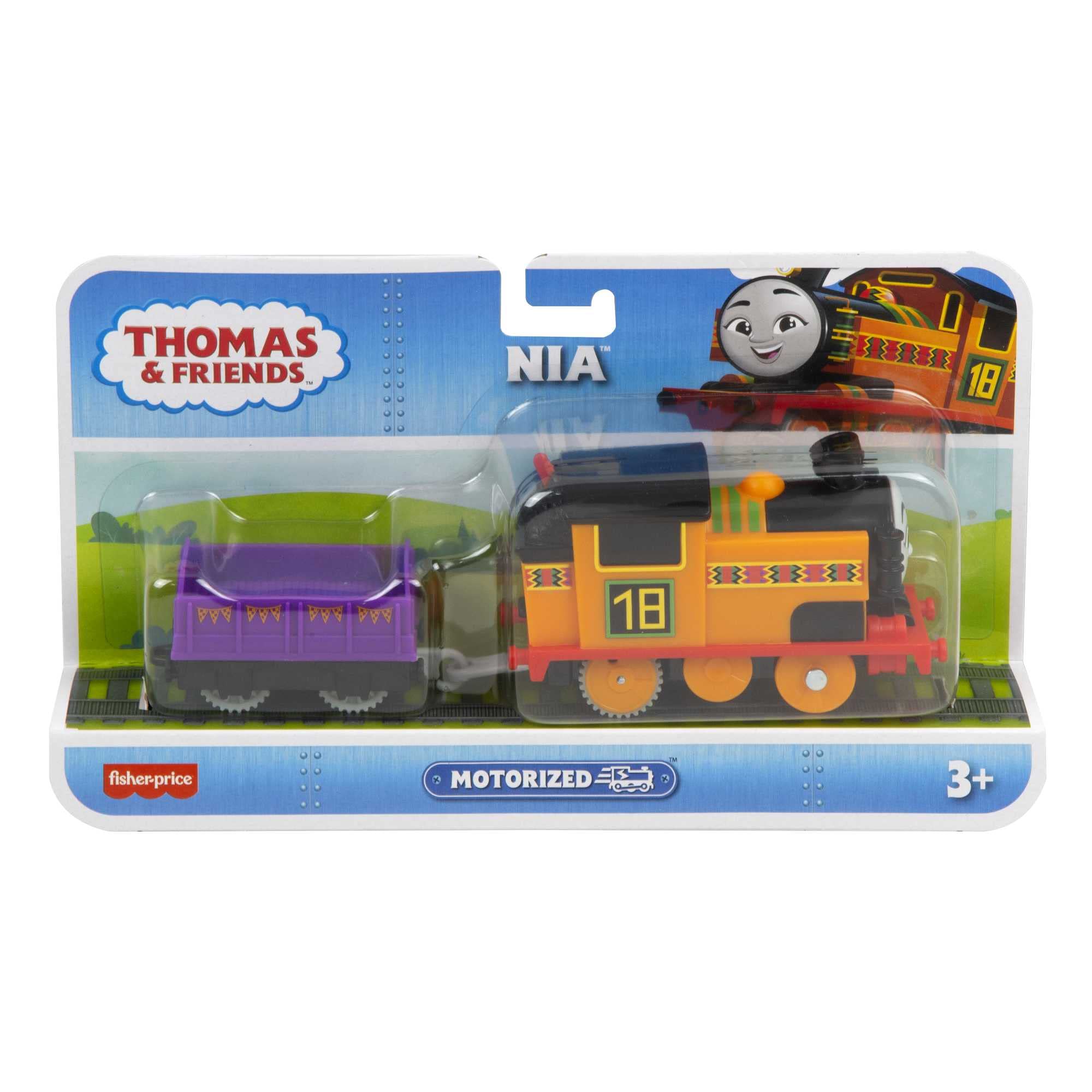 Nia engine on track with cargo car during pretend play.