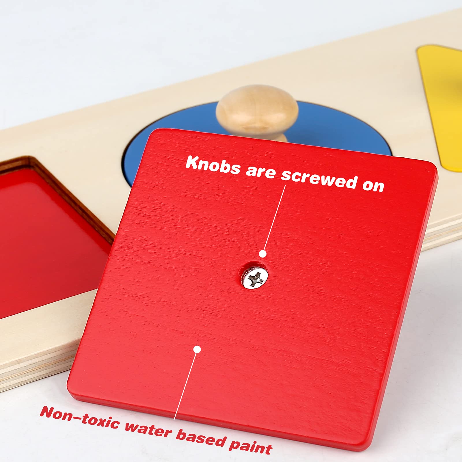 Thoth wooden shape puzzle close-up highlights knob detail and bright colors.