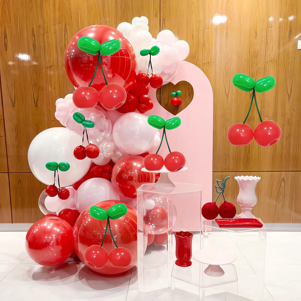 TiAaihion green and red balloons add vivid color to celebrations.