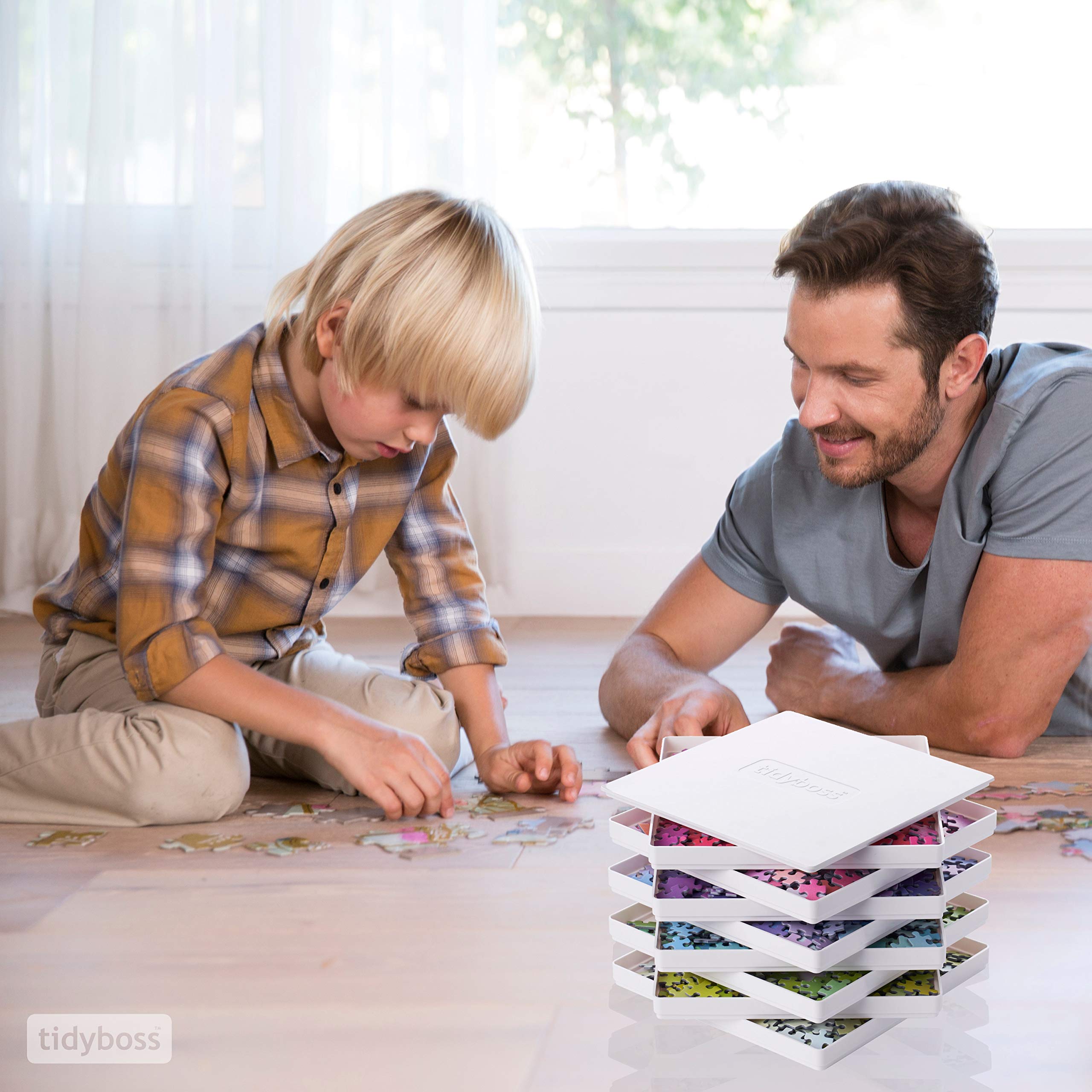 Tidyboss portable puzzle board keeps pieces organized while solving