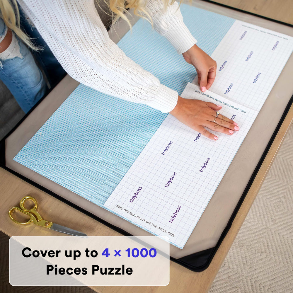 TIDYBOSS Strong Adhesive Finish shields puzzle pieces from dust and scratches.