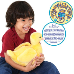 TigerHart Dani duckling plush in a hugging pose highlighting its huggable design.