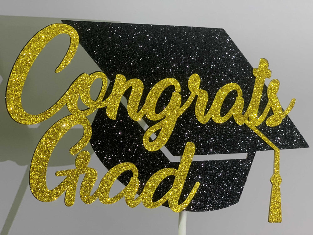 Tinbax Graduation cake topper glitter detail highlighting celebratory shine for photos.