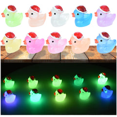 Tindobewan glow duck with Christmas hat miniature for slime crafts and dollhouses.