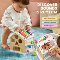Tiny Land 9-in-1 cube doors side invites interactive pretend play.