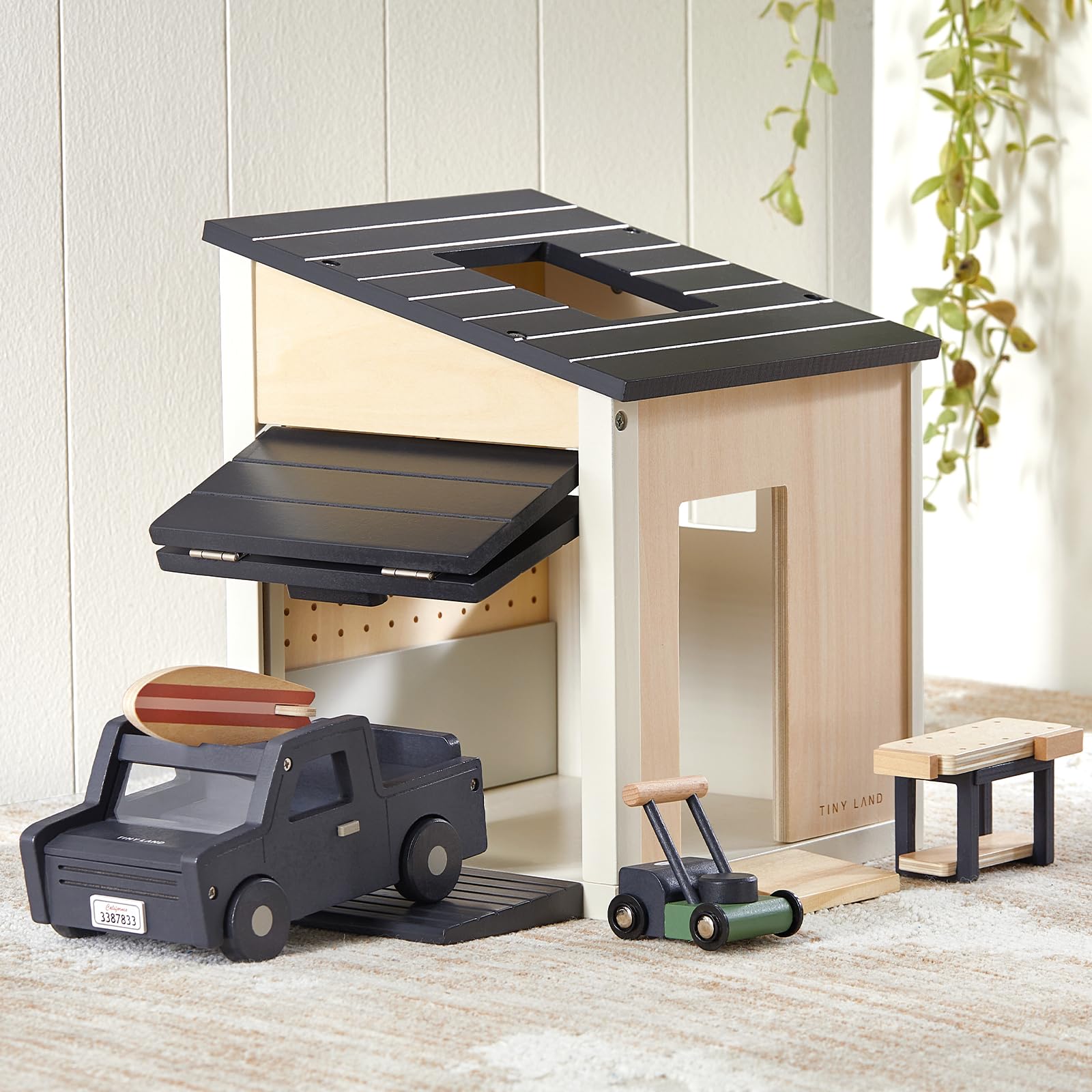 Tiny Land dollhouse garage set with a realistic garage for imaginative pretend play.