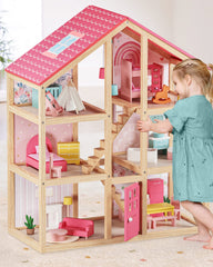 Tiny Land 6-room dollhouse front view with open-plan layout for imaginative play.