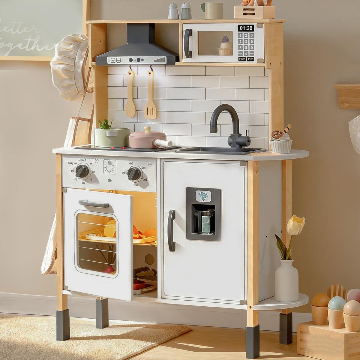 Tiny Land play kitchen stove lights boost immersive pretend cooking experiences.