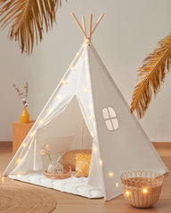 Tiny Land Teepee Tent in white cotton canvas creates a cozy play space for kids.