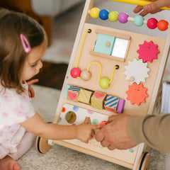 Tiny Land walker baby pushing and playing to build confidence