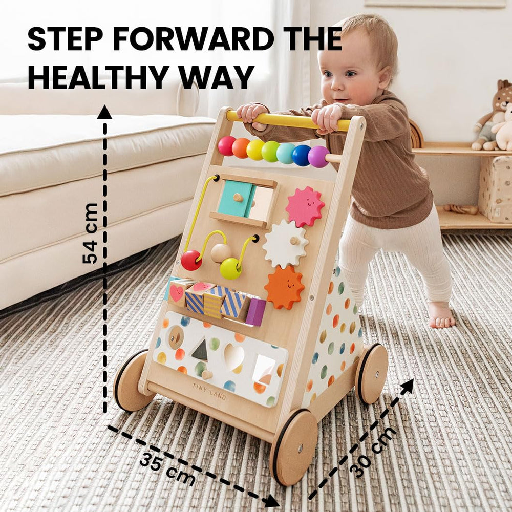 Tiny Land walker floor-friendly wheels protecting surfaces during pushes