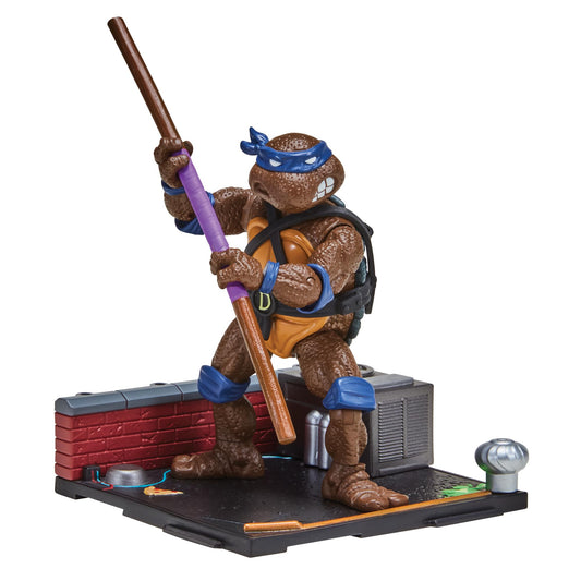 Donatello remastered 4in figure by TMNT, ready for dynamic poses and display.