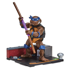 Donatello remastered 4in figure by TMNT, ready for dynamic poses and display.