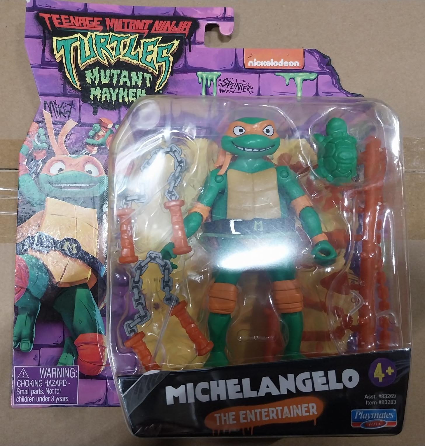 TMNT Mutant Mayhem Michelangelo blister-pack packaging with bold artwork