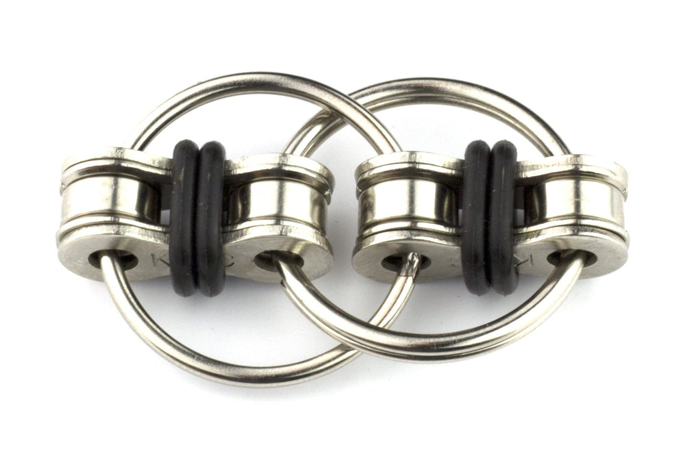 Tom's Fidgets Original Flippy Chain Fidget Toy — black closeup shows sturdy links for durable daily use.