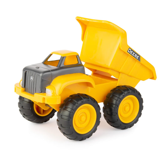 TOMY John Deere tractor with front loader for outdoor construction.