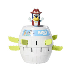 Kids taking turns sliding sticks into Bluey’s barrel