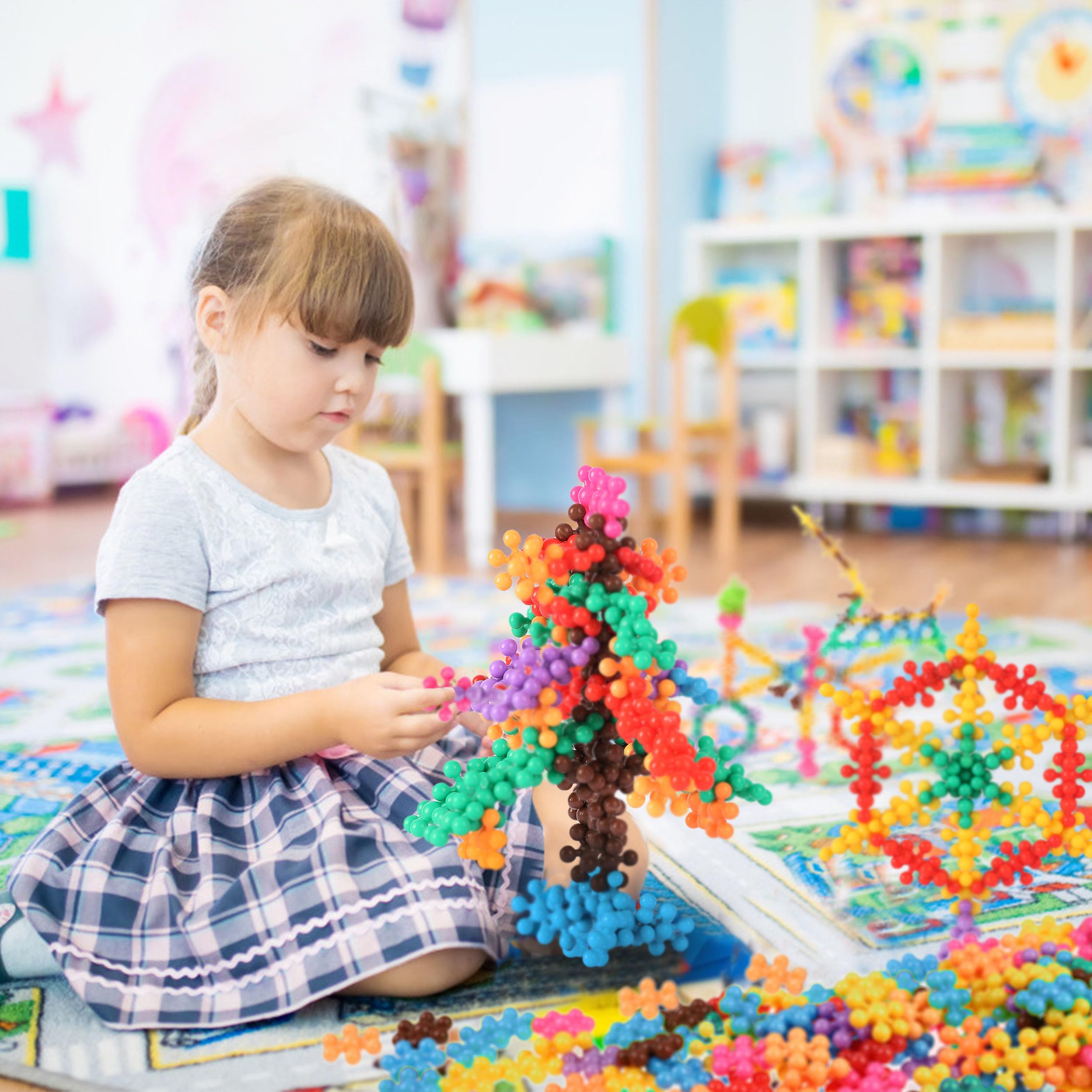 TOMYOU blocks in action showing creative structures, promotes problem-solving and planning