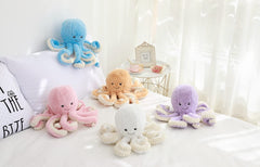 TONGSONG blue 23.6-inch octopus plush supports cozy play sessions.