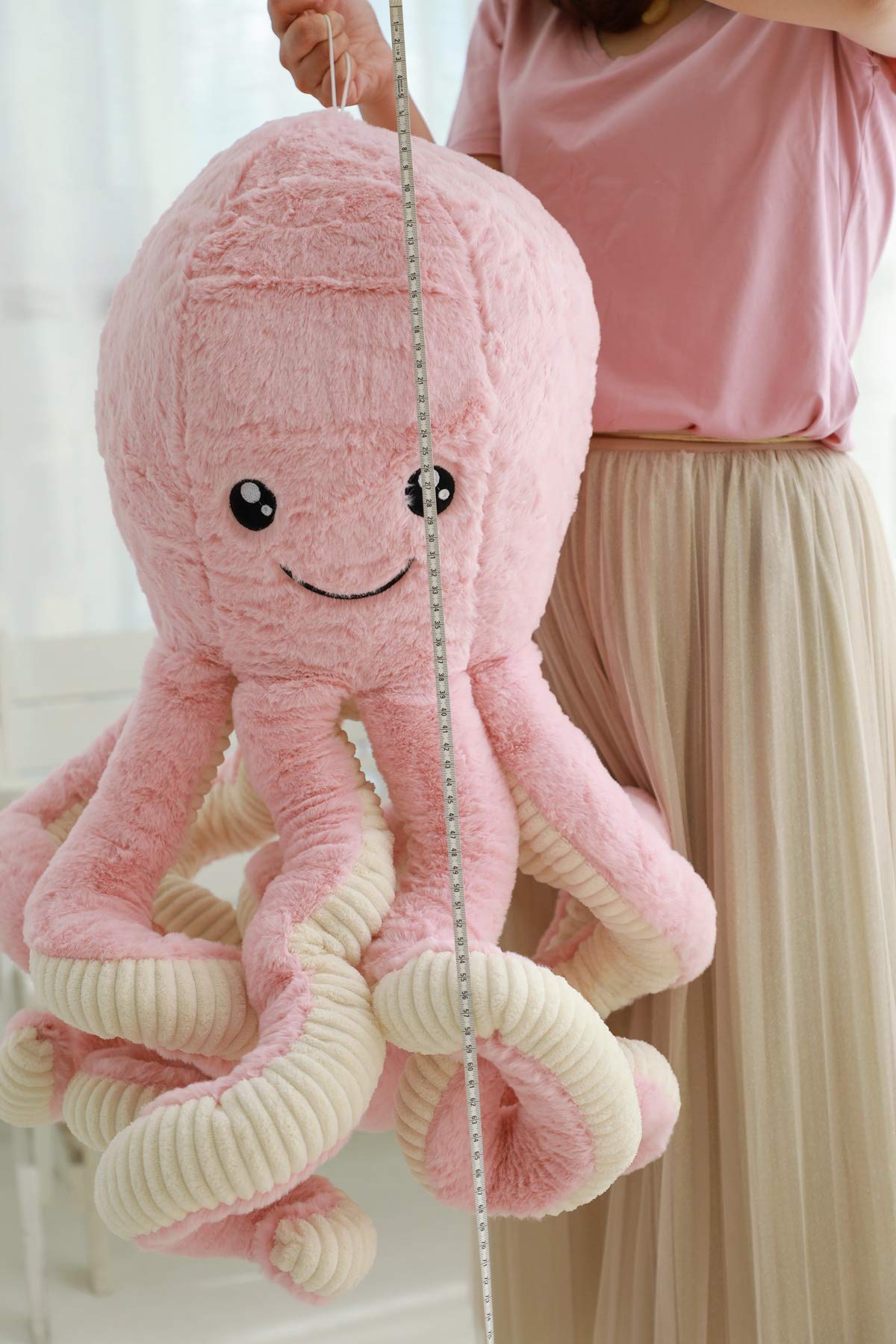 TONGSONG purple 31.5-inch octopus plush stands out in a gift-worthy display.