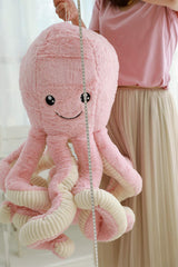 TONGSONG purple 31.5-inch octopus plush stands out in a gift-worthy display.