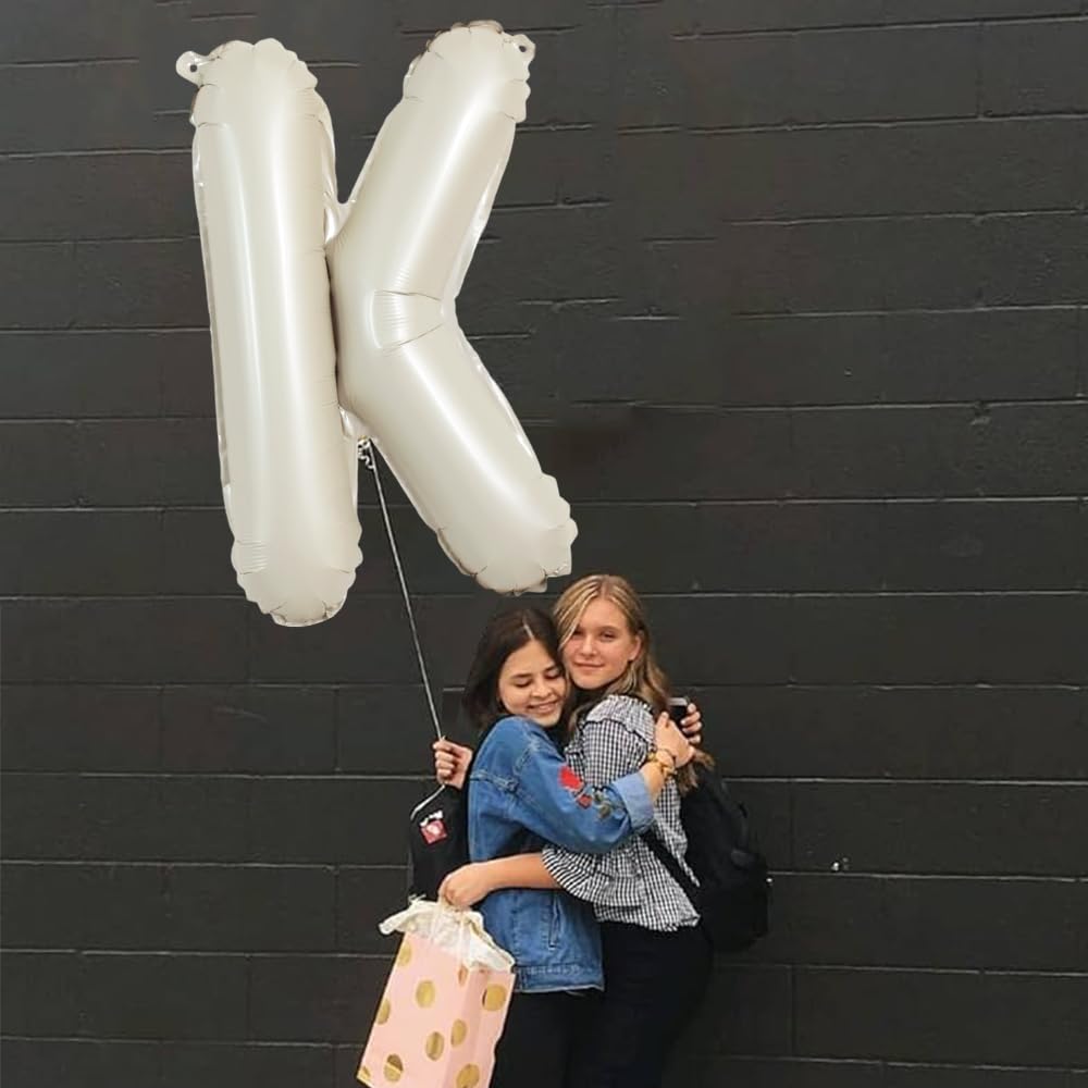 TONIFUL oversized K balloon used as a memorable photo prop.