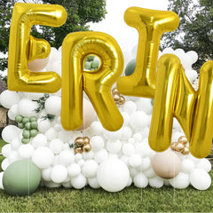 TONIFUL 40-inch gold N balloon used as centerpiece decor