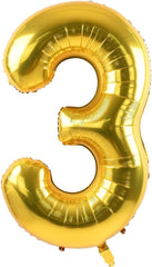 TONIFUL 40-inch gold number balloon at a New Year Eve party