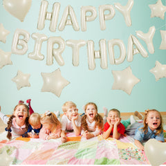 TONIFUL foil heart balloons add soft, celebratory accents to the scene