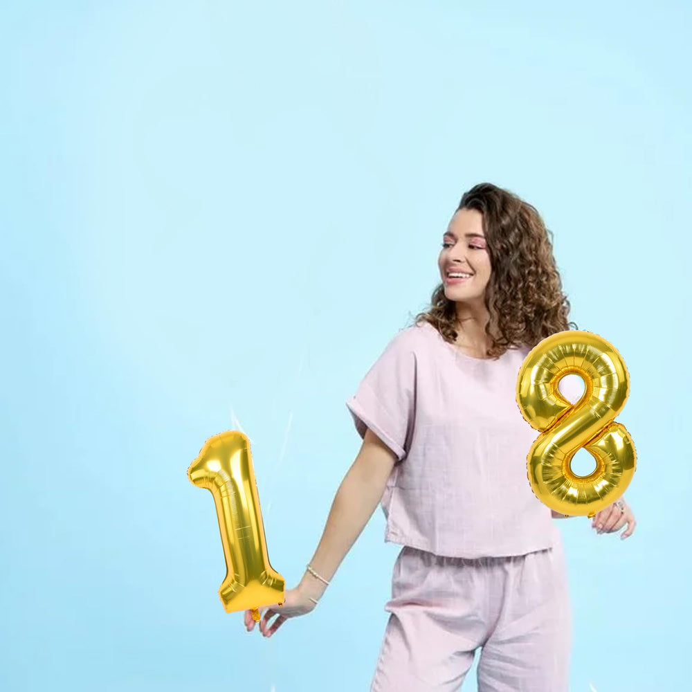 TONIFUL gold foil balloons enhance party decor and photos.