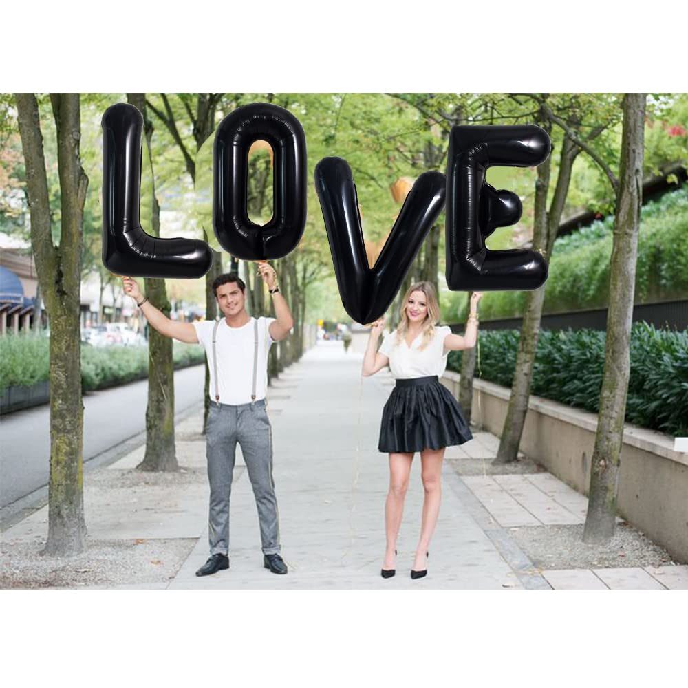 TONIFUL black L letter balloon as centerpiece decor.