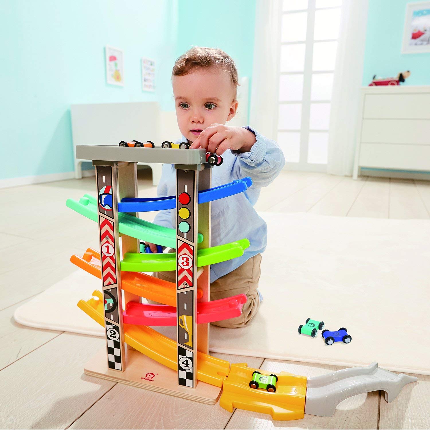 Top Bright wooden race track colorful pieces support color recognition during play.