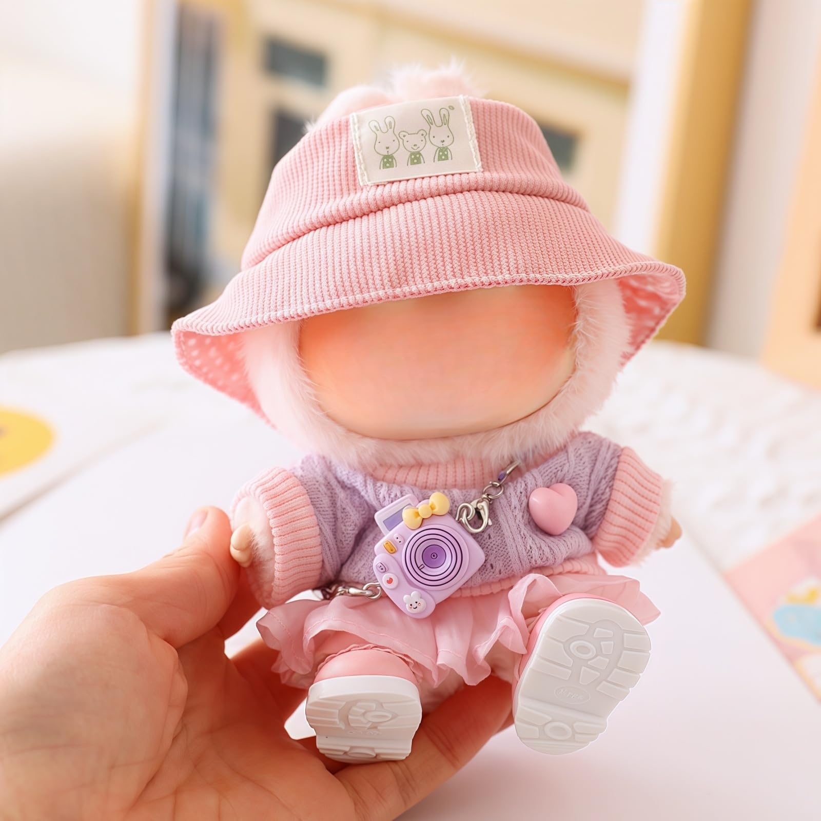 TOU-BEGUIN 17cm doll sweater offers soft comfort for daily play.