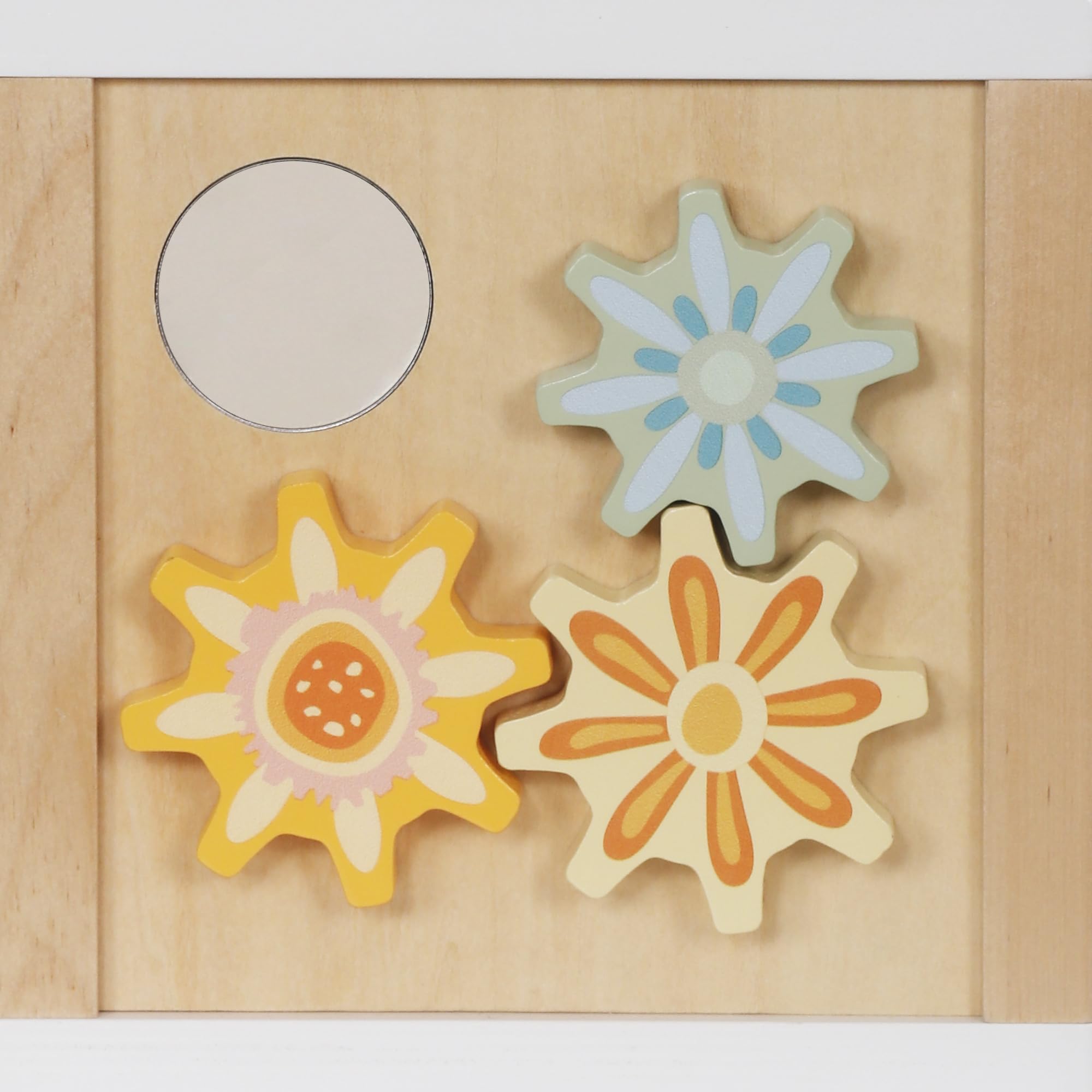 Touch Us wooden activity cube flip board encourages color and pattern recognition.