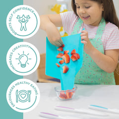 TOVLA JR kid-safe knife set guiding children's fruit prep.