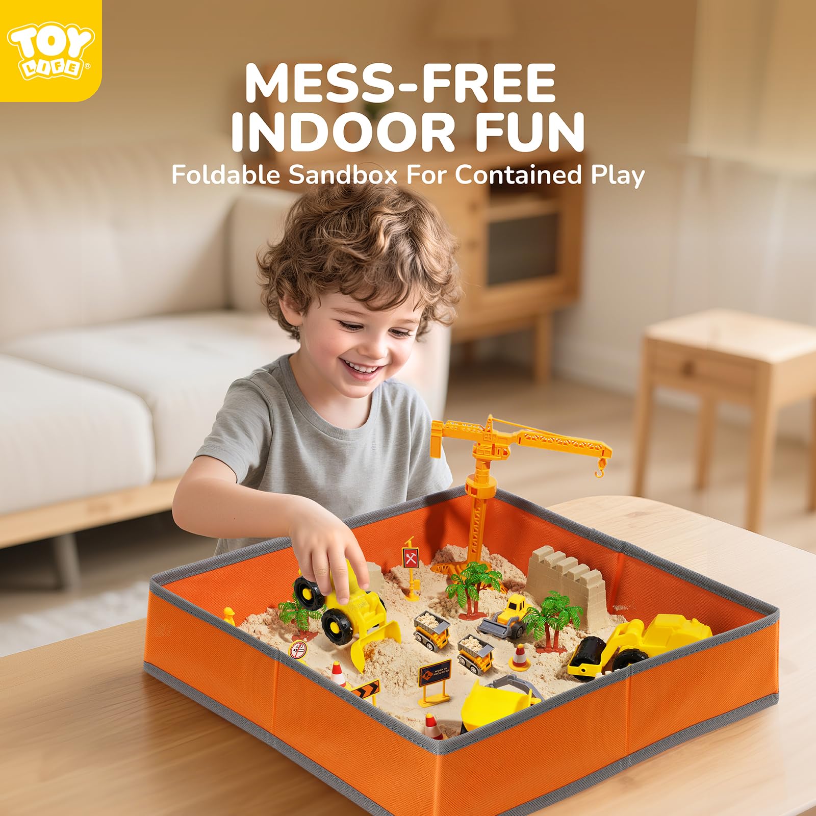 TOY Life foldable sandbox in action, keeping sand contained for indoor fun.