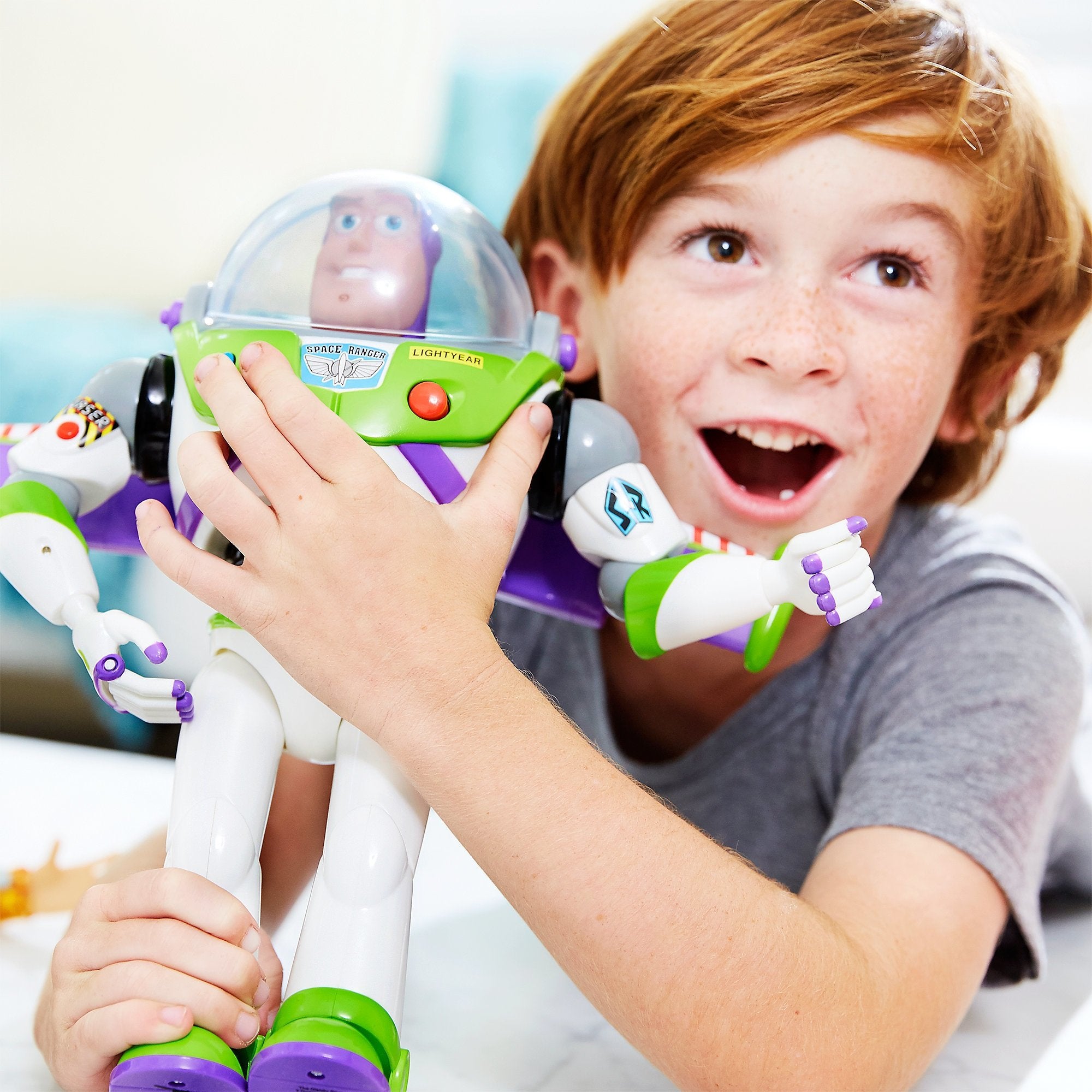 Toy Story Buzz Lightyear figure wing-release feature enhances action-ready poseability.