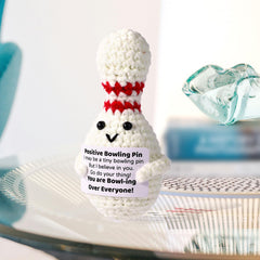 TOYMIS bowling ball plush displayed on a desk for cheerful ambiance