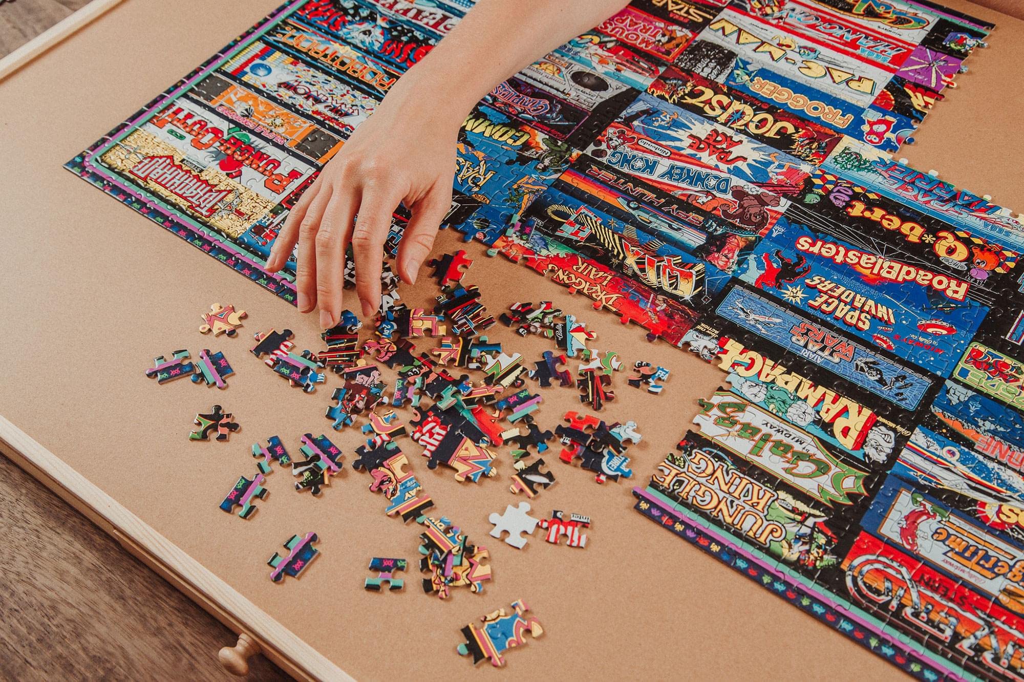 Toynk Arcadeageddon puzzle display-ready board and box art inspiration.