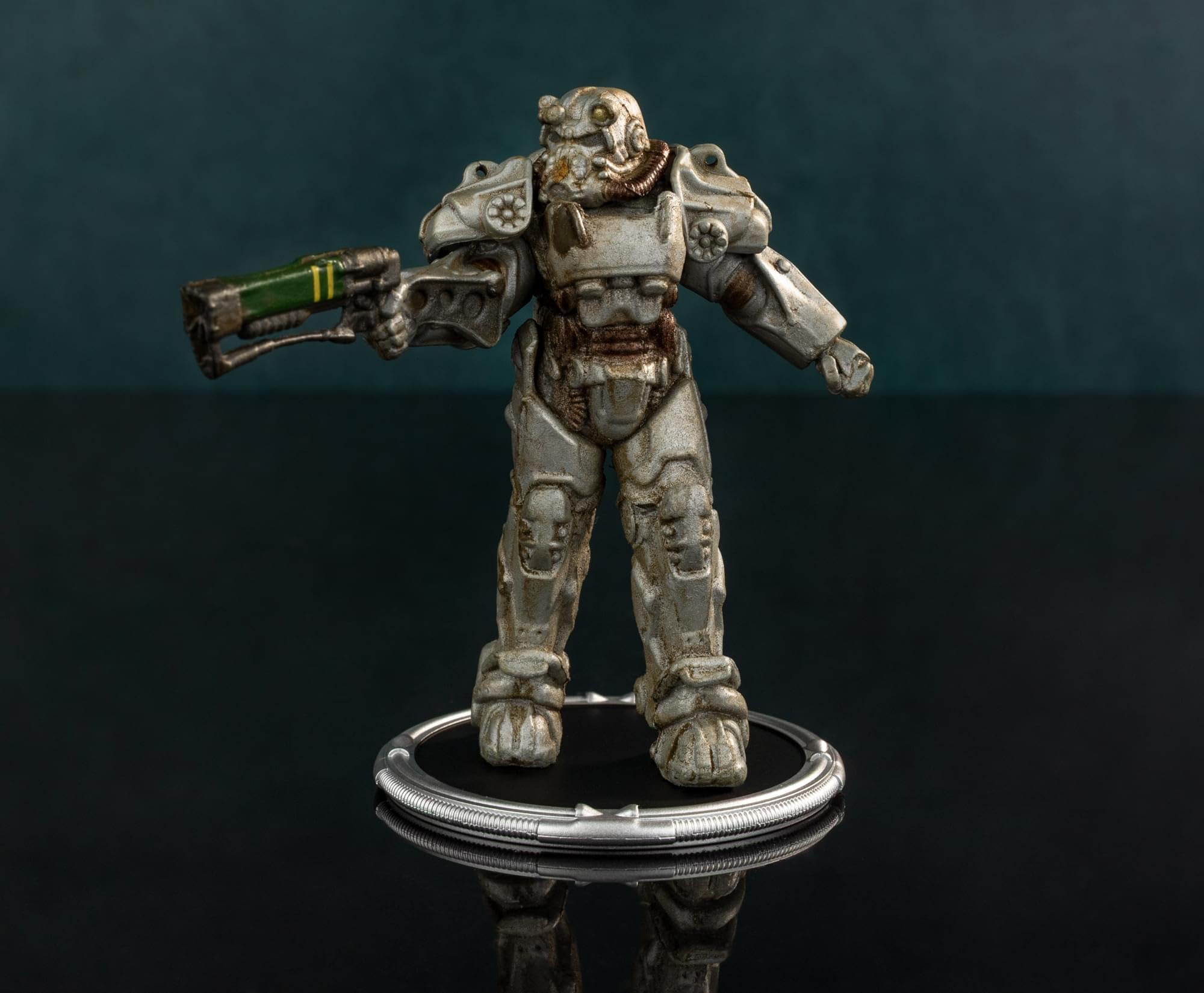 Toynk Fallout T-60 mini-figure on a stable base for secure display.