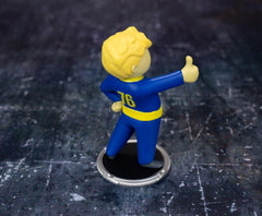 Vault Boy thumbs-up figure on a display stand for your collection.