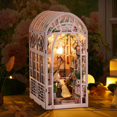 TOYQI Book Nook Kit LED lighting highlights a warm interior